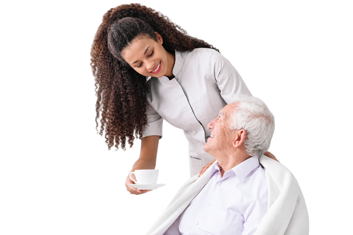 Caregiver serving tea to an older client at home